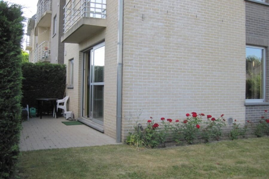 Gezellig gelijkvloers appartement met tuin en garage